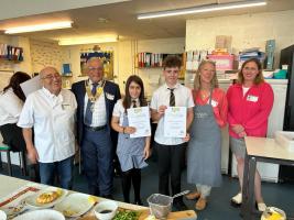 Pupils of Deri View school proudly showing the certificates they received for taking part in the Rotary Young Writer competition.